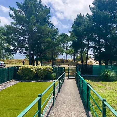 Apartamento jardín privado y piscina a 100 m playa